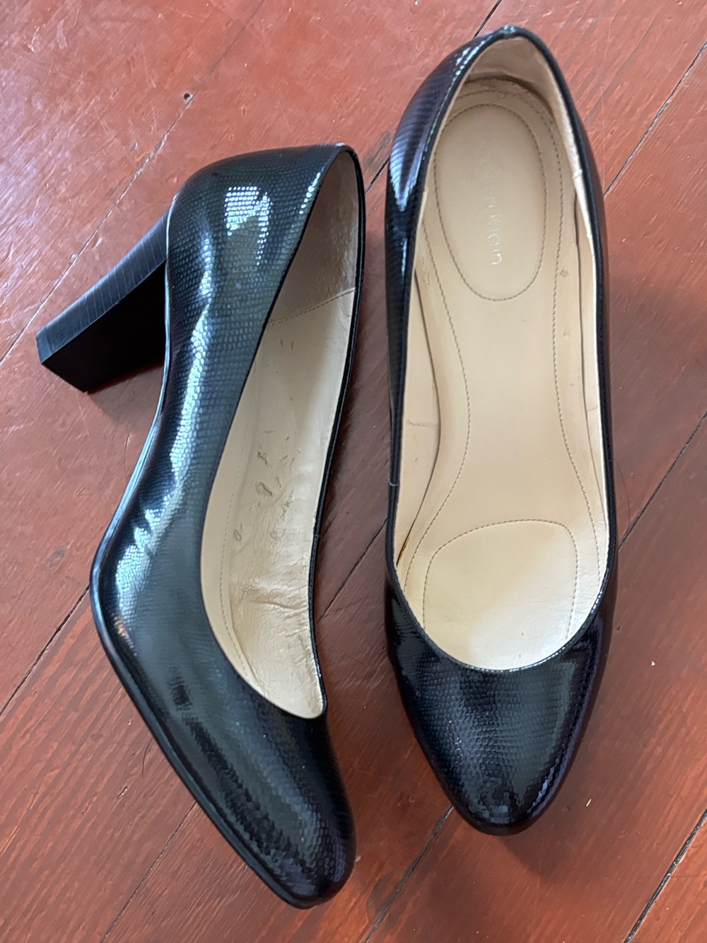 CK Women’s faux snake skin pumps